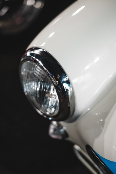 white car with silver headlight
